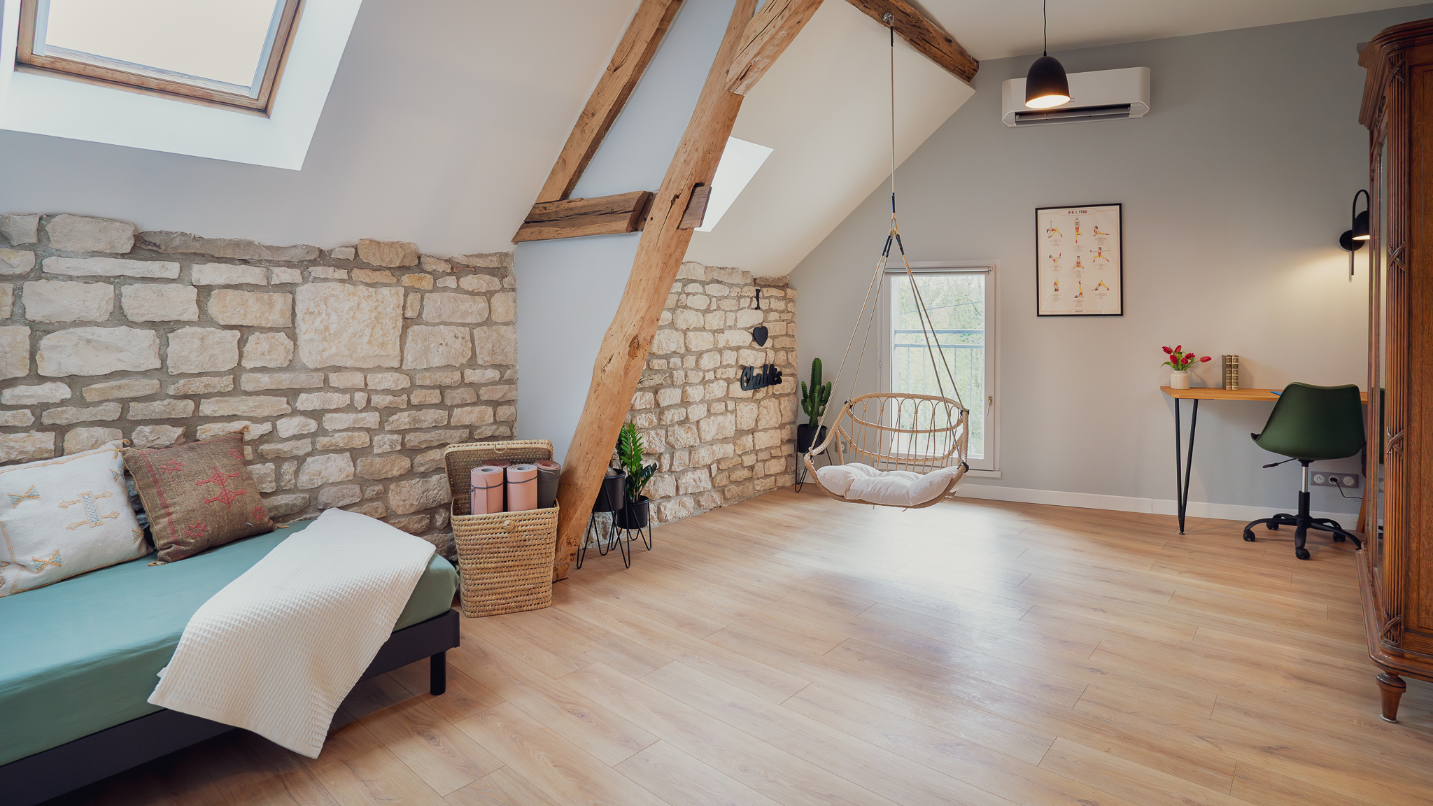 Attic landing with hanging chair and yoga area