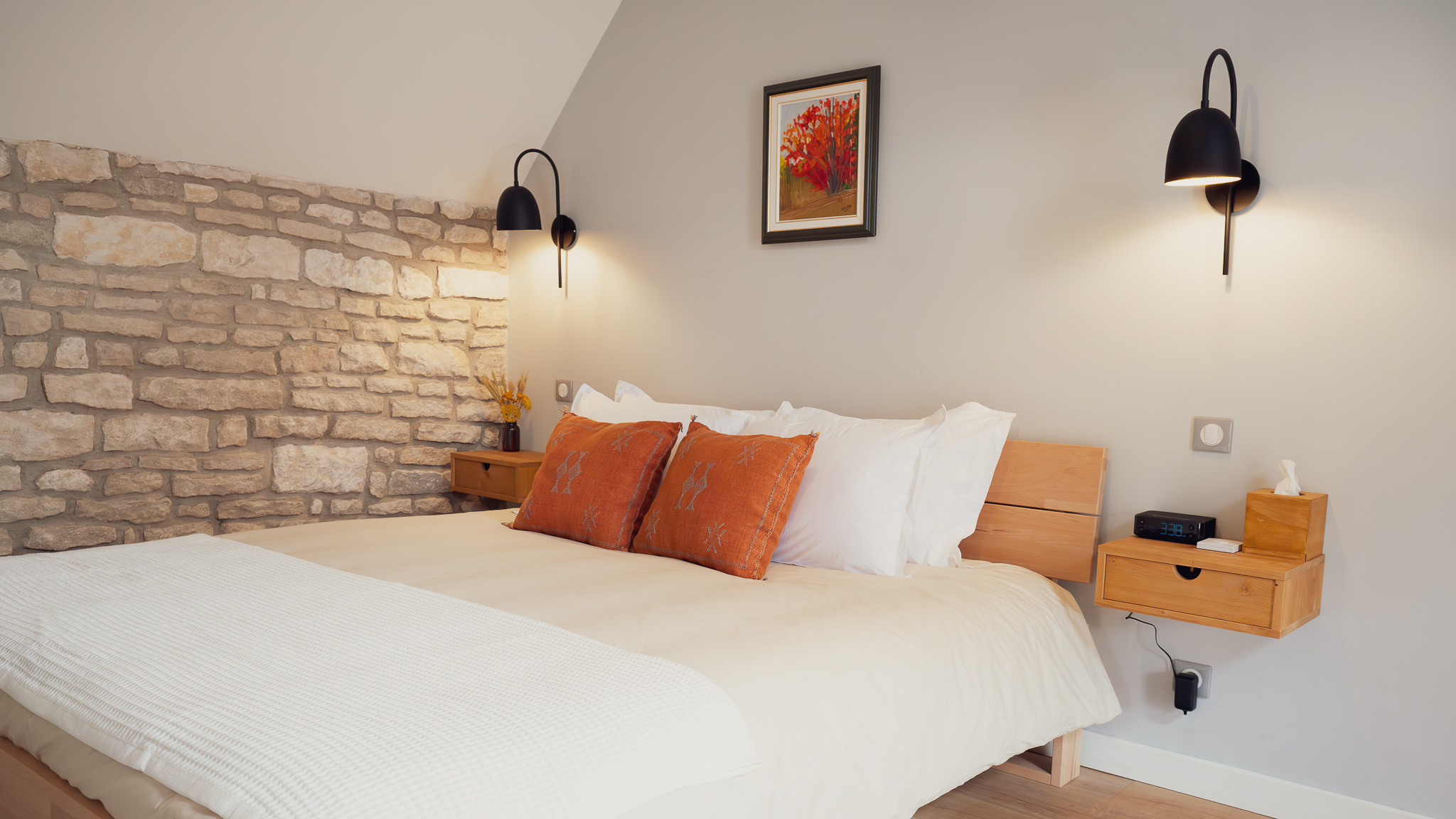 Restored bedroom detail at Maisons Vaudésir