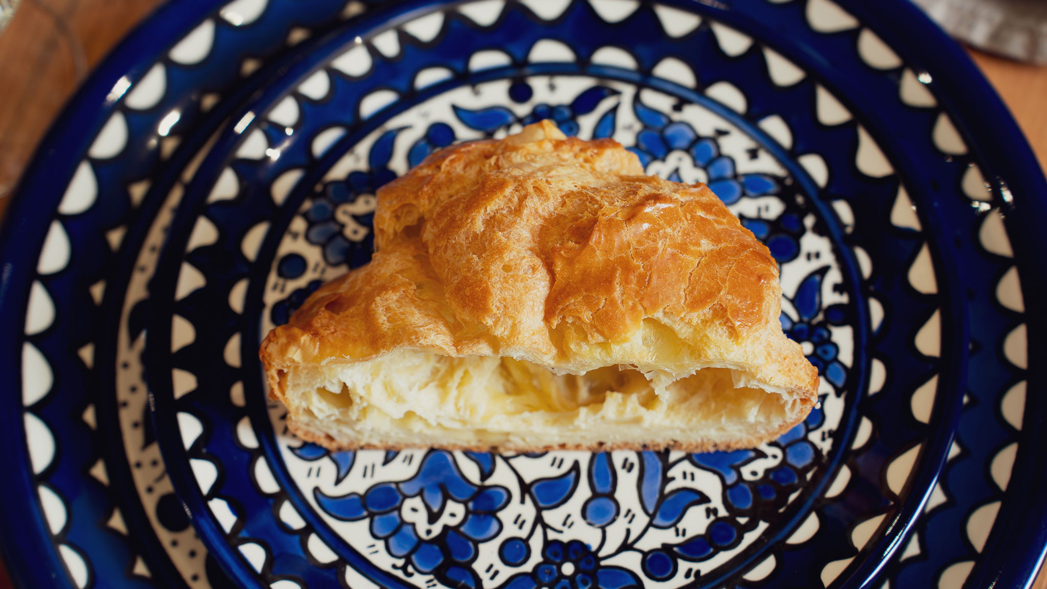 Pastry on hand-painted blue ceramic plate